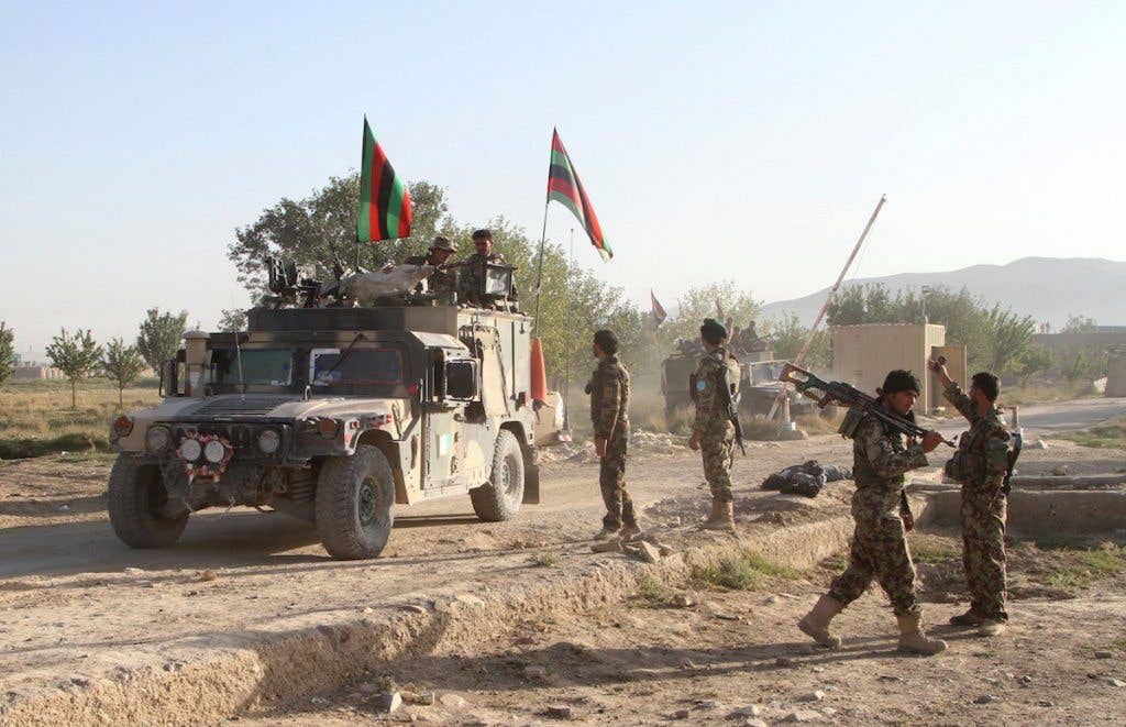 Afghan troops in an armored vehicle
