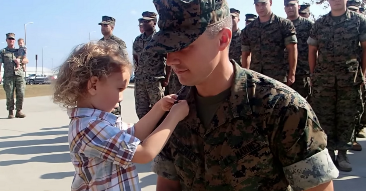 Watch this Marine get pinned by his 3-year-old son