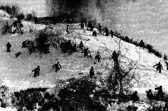 Chinese troops attacking the Marines at Chosin.