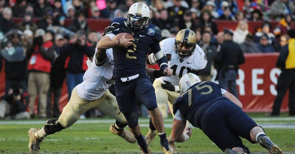 The Army Black Knights and Navy Midshipmen play in the 2011 Army-Navy game. (US Navy photo)