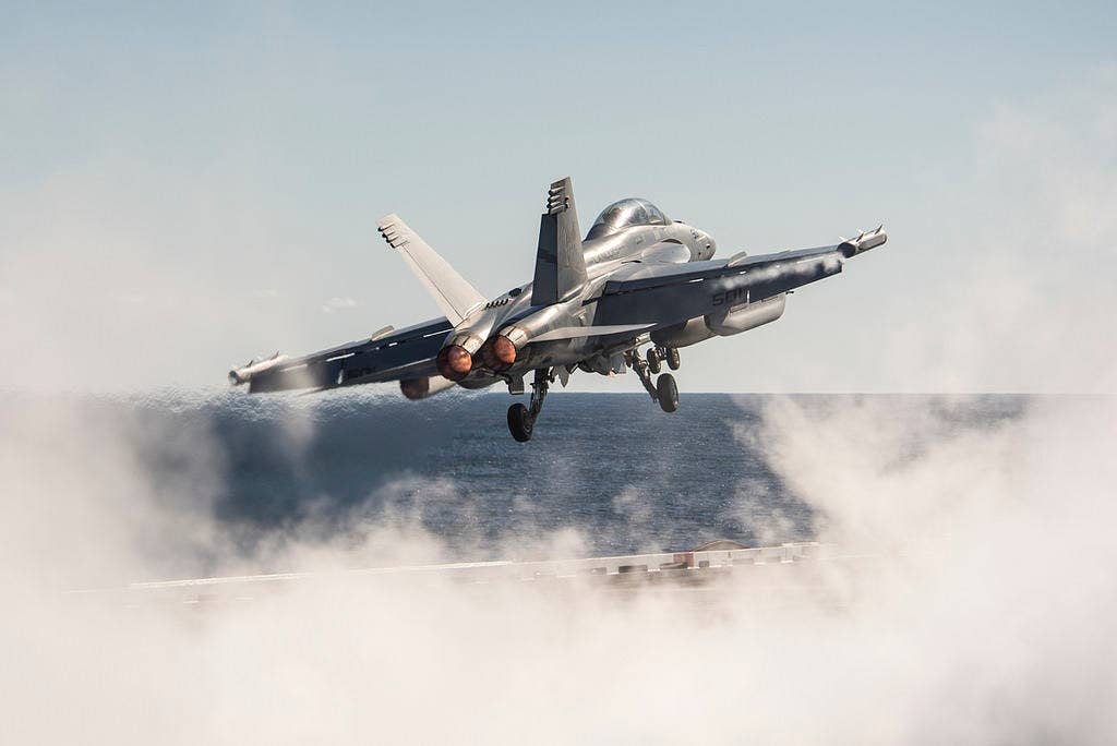 An E/A-18G Growler assigned to the Lancers of Electronic Attack Squadron (VAQ) 131 launches from the aircraft carrier USS George H.W. Bush (CVN 77). (U.S. Navy photo by Mass Communication Specialist 3rd Class Christopher Gaines)