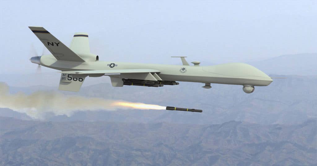 A Reaper drone firing a guided missile.