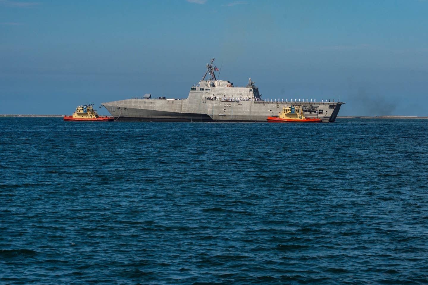 The littoral combat ship USS Gabrielle Giffords (LCS 10) transits San Diego Bay to arrive at the ship's homeport of Naval Base San Diego. Gabrielle Giffords is the newest Independence-variant littoral combat ship and one of seven littoral combat ships homeported in San Diego. (U.S. Navy photo by Mass Communication Specialist Seaman Nicholas Burgains)