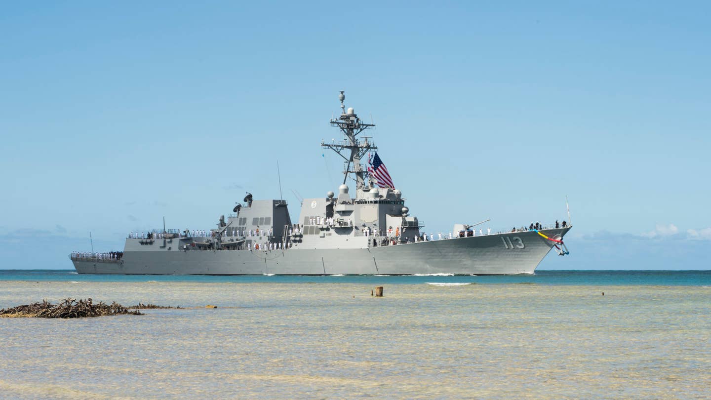 The Arleigh Burke-class guided-missile destroyer USS John Finn (DDG 113) arrives at Joint Base Pearl Harbor-Hickam in preparation for its commissioning ceremony. DDG 113 is named in honor of Lt. John William Finn, who as a chief aviation ordnanceman was the first member of our armed services to earn the Medal of Honor during World War II for heroism during the attack on Pearl Harbor. (U.S. Navy photo by Mass Communication Specialist Randi Brown)