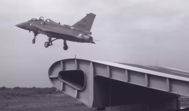 An Indian Navy prototype HAL Tejas takes off during tests to determine if it could operate off carriers. (Youtube Screenshot)
