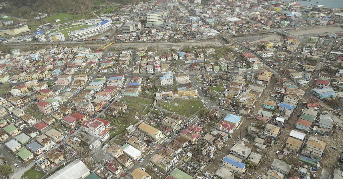 Aerial view of part of Roseau, revealing widespread damage to roofs. (Photo from UK DFID)
