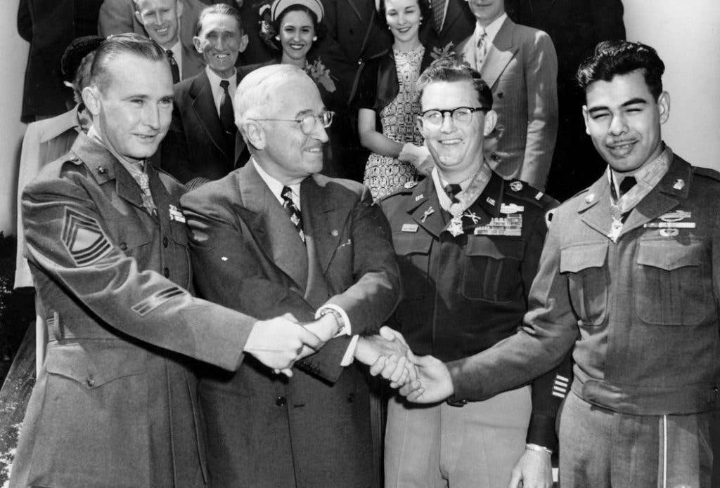 Hernandez (far right) after receiving the Medal of Honor from President Truman.