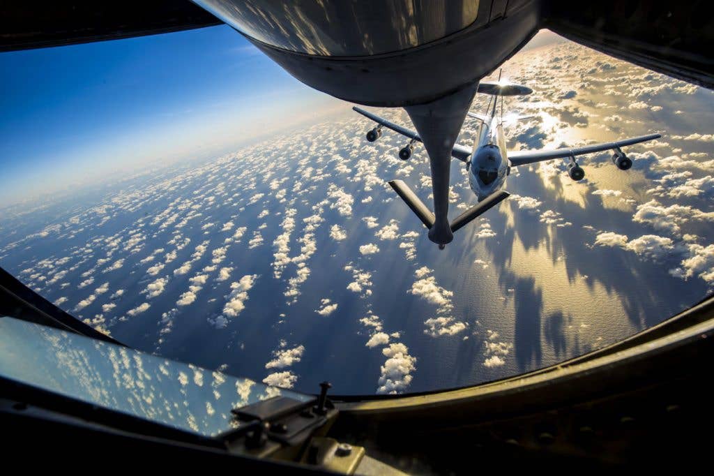 An E-3 Sentry assigned to the 961st Airborne Air Control Squadron approaches the boom pod of a KC-135 Stratotanker assigned to the 909th Aerial Refueling Squadron to receive fuel during Cope North 2017, Feb. 22, 2017. The exercise includes 22 total flying units and more than 2,700 personnel from three countries and continues the growth of strong, interoperable relationships within the Indo-Asia-Pacific region through integration of airborne and land-based command and control assets. (U.S. Air Force photo by Senior Airman Keith James)