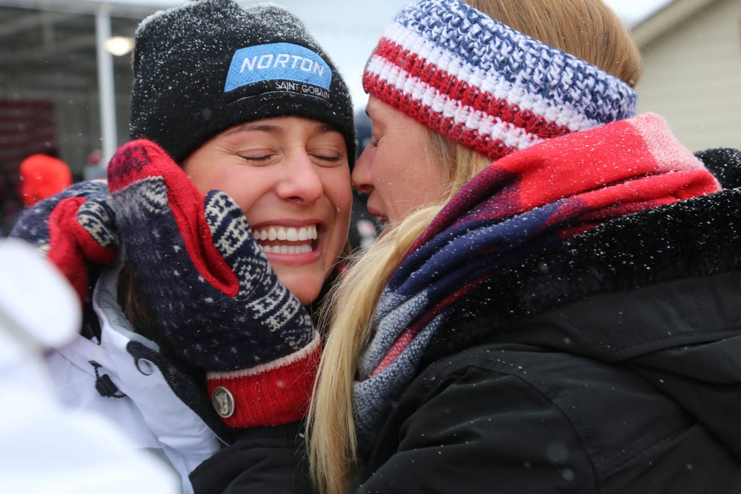 Sgt. Emily Sweeney (left) is congratulated by her sister, Megan, after qualifying for the 2018 Winter Games in luge women's singles Dec. 16 at Lake Placid, New York. Emily missed making the 2010 Games in Vancouver after losing to Megan in a race off. Emily Sweeney makes her Olympic debut next month in PyeongChang, South Korea. (U.S. Army photo by Spc. Jennily Leon)