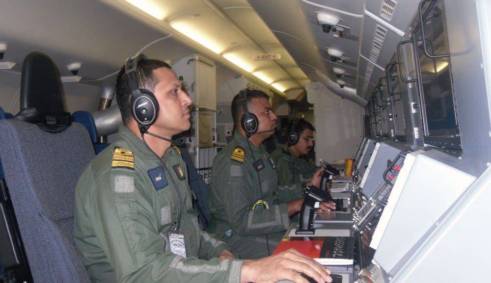 P-8I crew at their workstations during the Search and Rescue sortie in South Indian Ocean on 23 Mar 2014. (Image from Wikipedia)