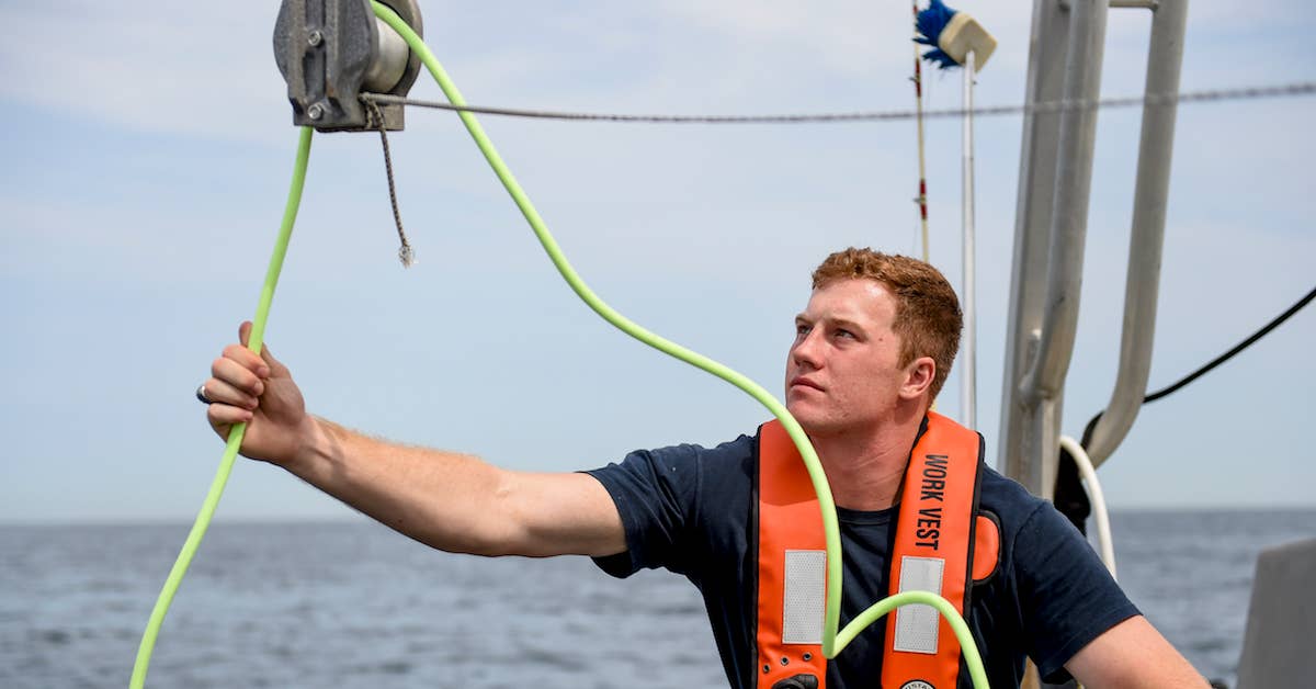U.S. Naval Academy (USNA) Midshipman 1st Class Nolan Brandon monitors the cables leading to a remotely operated vehicle as it dives on the wreck of the World War I-era armored cruiser USS San Diego (ACR 6), Sept. 12. (U.S. Navy photo by Mass Communication Specialist 1st Class Eric Lockwood/Released)