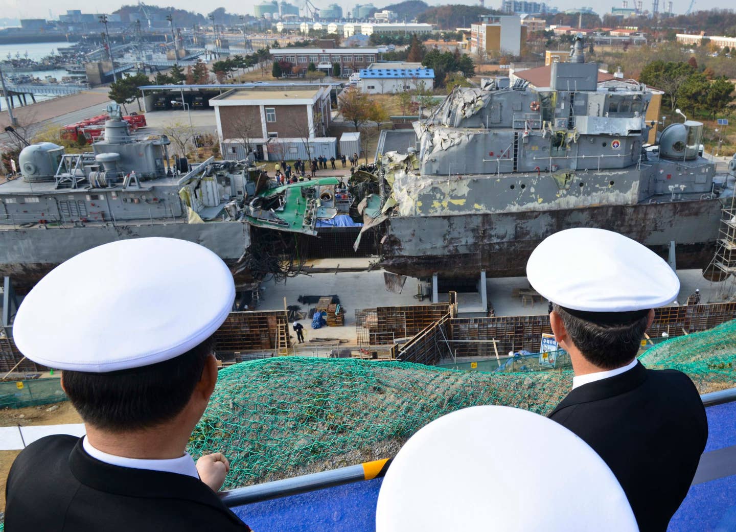 Adm. Harry B. Harris Jr., commander of U.S. Pacific Fleet, and Rear Adm. Lisa Franchetti, commander of U.S. Naval Forces Korea, and Rear Adm. Park Sung-bae, commander of the Republic of Korea Navy Second Fleet, tour the ROKS Pohang-class corvette Cheonan that was sunk by a North Korean torpedo on March 26, 2010. (U.S. Navy photo by Mass Communication Specialist 1st Class Joshua Bryce Bruns)