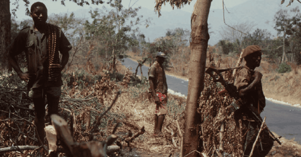 Tutsi soldiers and gendarmes guarding the road to Cibitoke on the border with Zaire. (Image Wikipedia)