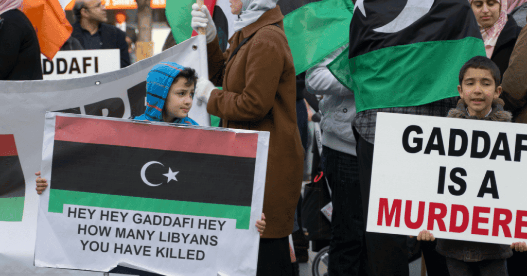 Children in Dublin, Ireland, protesting Libya's then president, Gaddafi, before his overthrow. (Image Wikipedia)