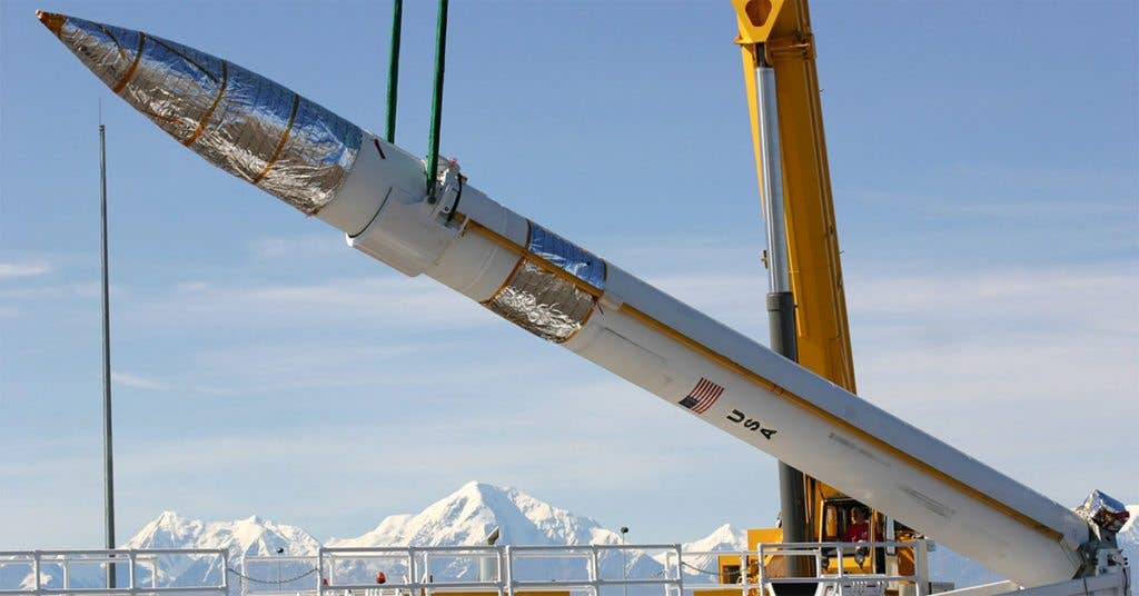 A ground-based missile interceptor is lowered into its missile silo during a recent emplacement at the Missile Defense Complex at Fort Greely, Alaska. (Army photo by Sgt. Jack W. Carlson III)