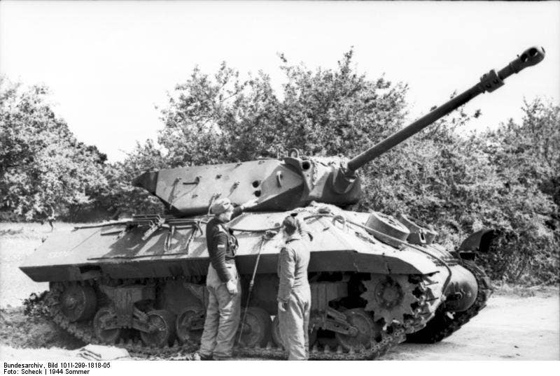 German troops check out an Achilles that was knocked out. Tank destroyers could dish it out, but taking it was a different matter. (Bundesarchiv photo)