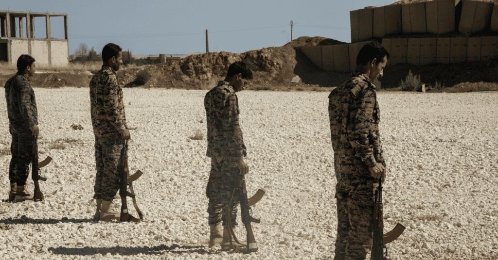 Syrian Arab trainees await commands from an instructor at a Syrian Democratic Forces' rifle marksmanship range in Northern Syria, July 31, 2017. Small arms and ammunition represent the majority of support from Coalition Forces to the SDF, the most capable and reliable force in Syria currently making daily gains to reclaim Raqqah from the hold of ISIS. (U.S. Army photo by Sgt. Mitchell Ryan)