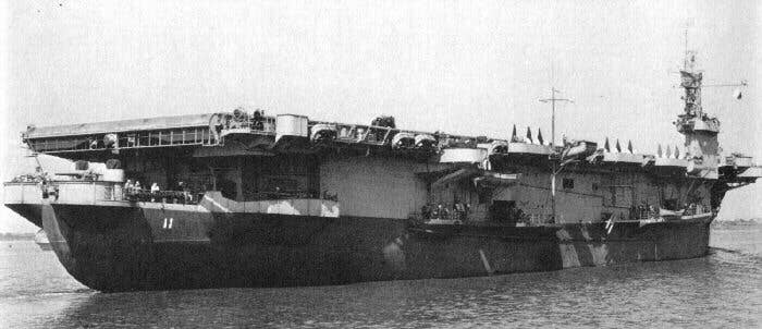 USS Card (CVE 11) in World War II. While she wasn't able to operate jets, she had a lot of space to transport materials, giving this escort carrier a second lease on life as a transport. (U.S. Navy photo)