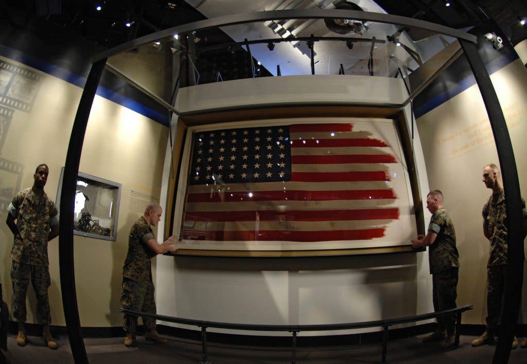 The original American flag raised on Mount Suribachi, Iwo Jima During World War II. (DoD photo by William D. Moss)
