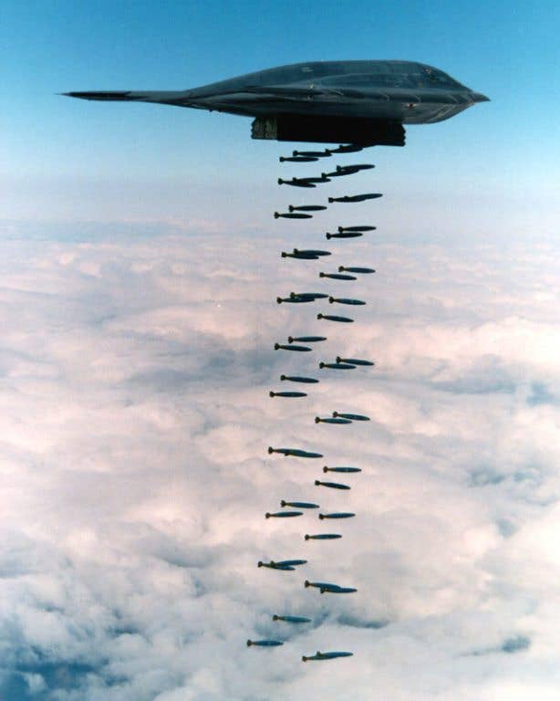 A B-2 Spirit drops a host of dumb bombs. (USAF photo)