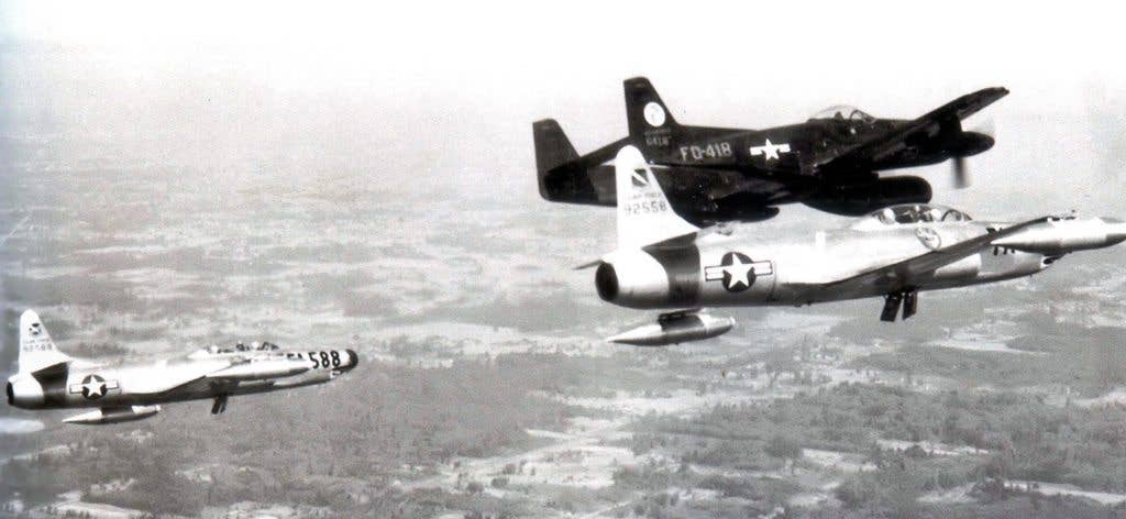 A North American F-82 Twin Mustang flying with two F-94 Starfires. The F-94s replaced the F-82 in Korea. (USAF photo)
