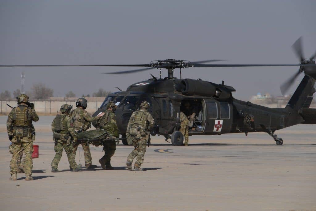 The Task Force Marauder medical evacuation (medevac) company participated in a mass casualty exercise with the Role 3 hospital, Dec. 23, 2017, in Afghanistan to practice and refine procedures in the event of a real-world emergency. (U.S. Army National Guard photo by Capt. Jessica Donnelly, Task Force Marauder)