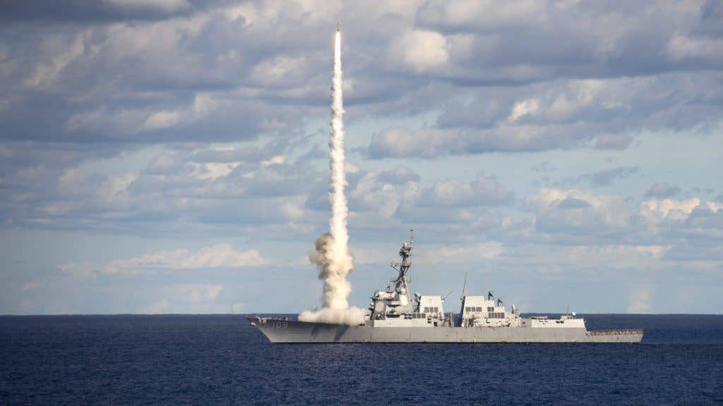 The guided-missile destroyer USS Jason Dunham (DDG 109) launches a SM-2 missile during a live-fire exercise. Jason Dunham is underway with the Harry S. Truman Carrier Strike Group preparing for future operations. (U.S. Navy photo by Mass Communication Specialist 3rd Zachary Van Nuys/Released)