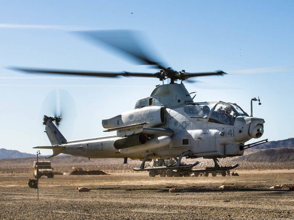 A Bell AH-1Z Viper takes off at a Forward Arming and Refueling Point at Marine Corps Air Ground Combat Center, Twentynine Palms, Calif., Feb. 4, 2018, as a part of Integrated Training Exercise 2-18. (US Marine Corps/Pfc. William Chockey)