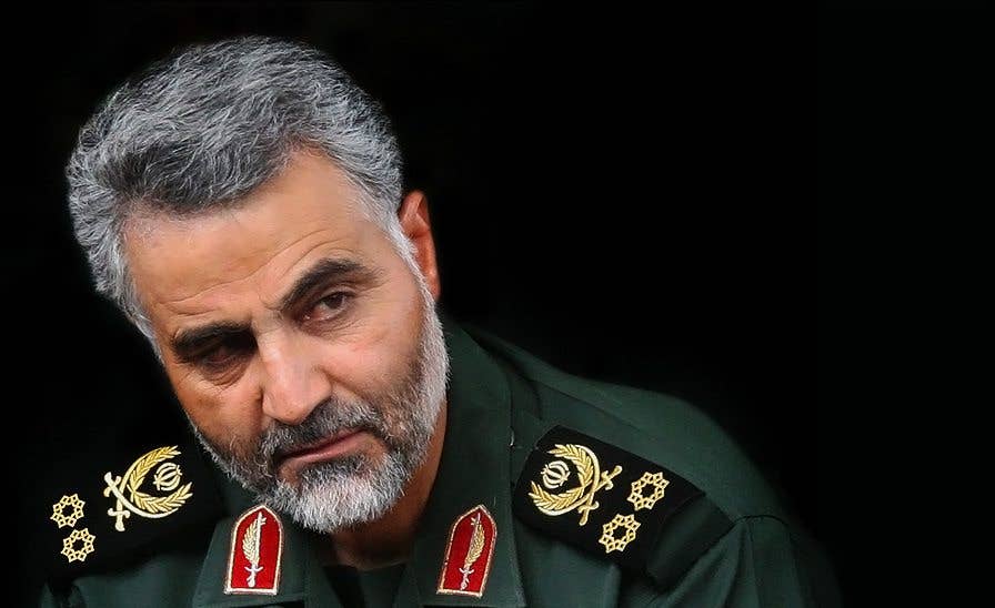 Quds Force commander Qasem Soleimani laughs in Iranian.