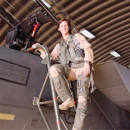 Above, Mau pictured next to her F-15 on deployment in Afghanistan.