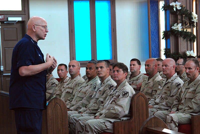 Vice Adm. Robert J. Papp speaks to members of Coast Guard Reserve Port Security Unit 305, deployed to Joint Task Force Guantanamo, during an all-hands meeting. (U.S. Navy photo)