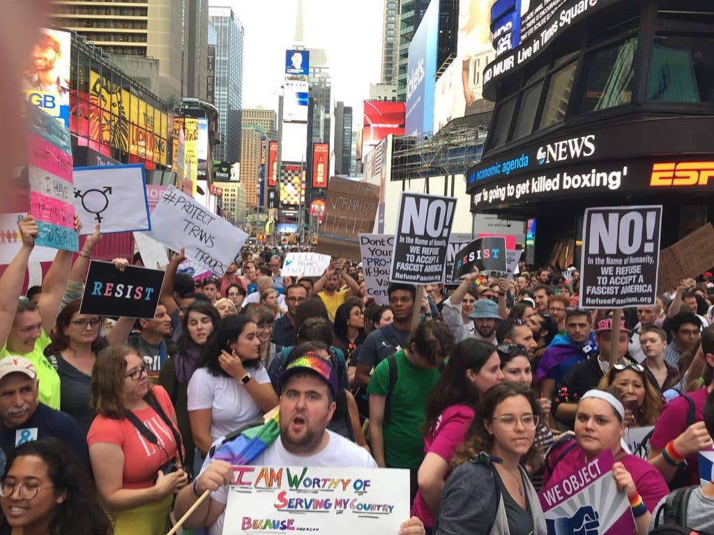 A protest held July 26, 2017 in Times Square outside the U.S. Army Recruiting Center in response to President Trump tweeting that transgender people would no longer be allowed to serve in the U.S. military. (Image via Jere Keys)