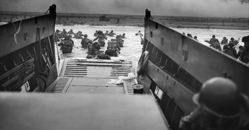 Army 1st Infantry Division troops land on Omaha Beach on D-Day. (Photo by U.S. Navy Chief Photographer's Mate Robert F. Sargent)