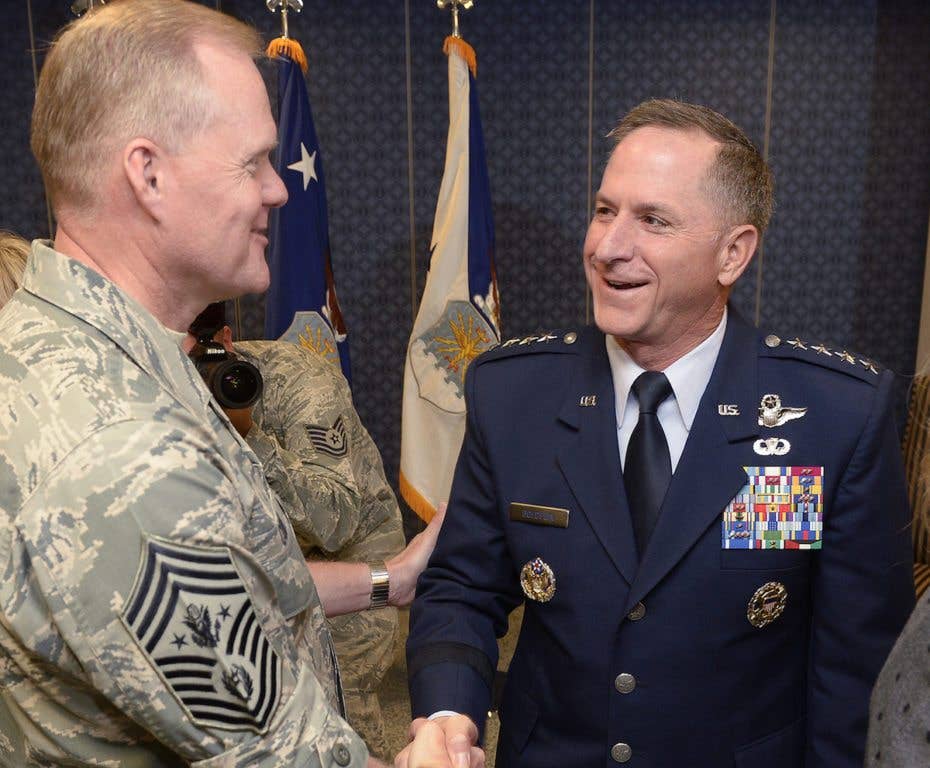 Chief Master Sgt. of the Air Force James A. Cody congratulates Air Force Chief of Staff Gen. David L. Goldfein after the general swore in during a ceremony at the Pentagon in Washington, D.C., June 1, 2016. Goldfein is the 21st Chief of Staff of the Air Force. (U.S. Air Force photo by Andy Morataya)