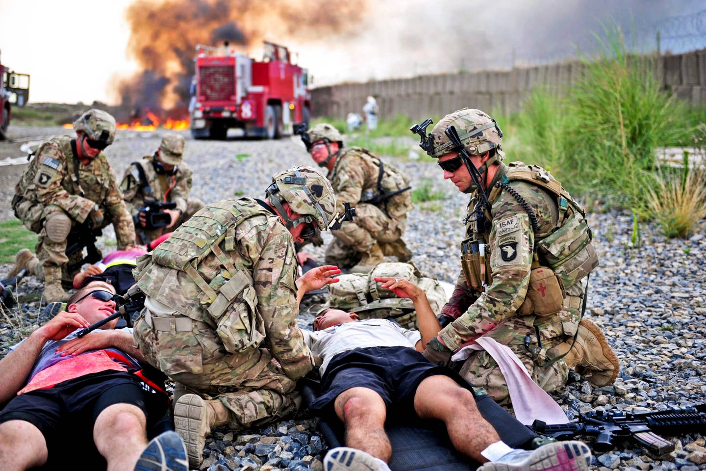 Soldiers conduct simulated casualty triage at Forward Operating Base, Solerno, Kandahar. (U.S. Army photo by Maj. Kamil Sztalkoper)