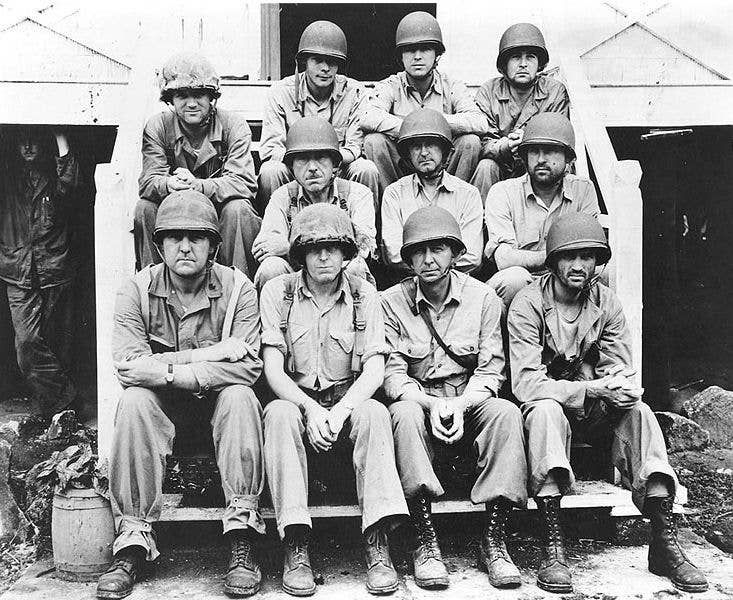 Lieutenant Colonel Edson (front row, second from left) poses for a group photo with other Marine officers on Tulagi shortly after the battle in August, 1942.