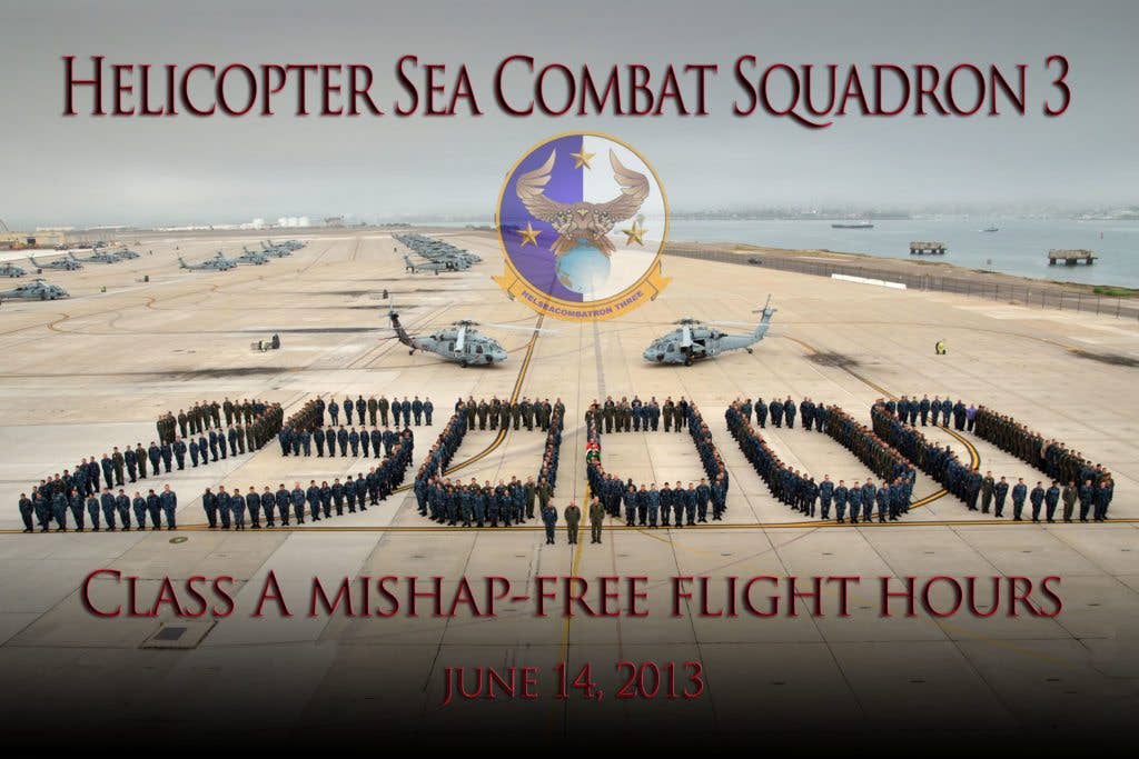 Sailors assigned to Helicopter Sea Combat Squadron (HSC) 3 stand in formation to signify that HSC-3 has reached 250,000 consecutive flight hours without a Class A mishap. A Class A mishap is classified as an accident with a destroyed aircraft, damages that exceed $2 million, a loss of life or a permanent total disability. (U.S. Navy photo illustration by Mass Communication Specialist 2nd Class Amanda Huntoon)