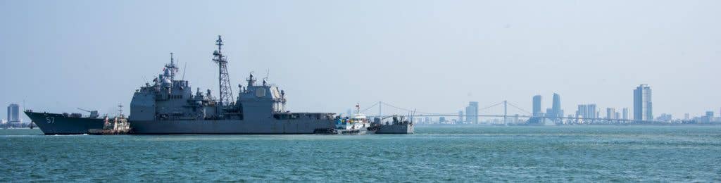 The guided-missile cruiser USS Lake Champlain (CG 57) arrives in Da Nang, Vietnam for a scheduled port visit. The ship is part of the Carl Vinson Strike Group and is in the Western Pacific as part of a regularly scheduled deployment. (U.S. Navy photo by Mass Communication Specialist 3rd Class Devin M. Monroe)