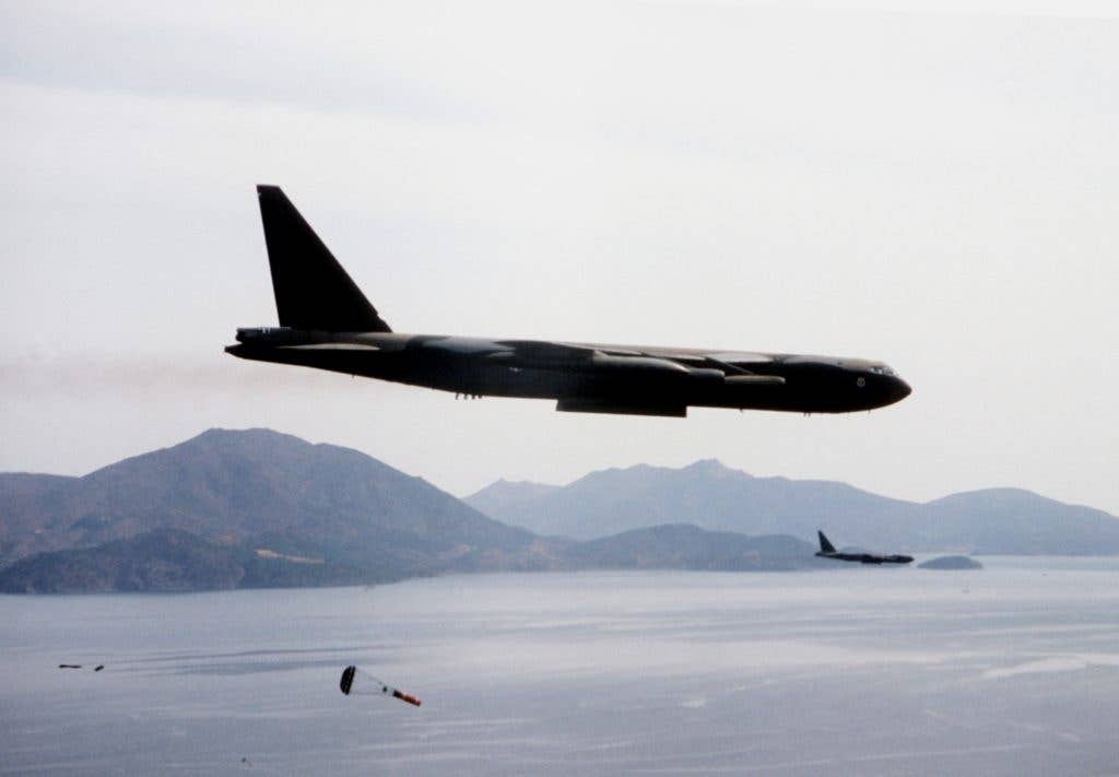  A B-52 drops Quick Strike mines in an enemy harbor
