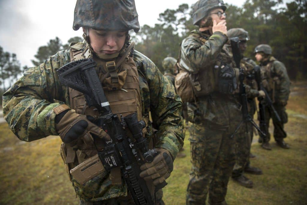 U.S. Marines with 3rd Battalion 8th Marine Regiment fire the M38 Squad Designated Marksmanship Rifle during a live-fire weapons exercise at range F-18 on Camp Lejeune, N.C., Dec. 8, 2017. (U.S. Marine Corps photo by Lance Cpl. Michaela R. Gregory)