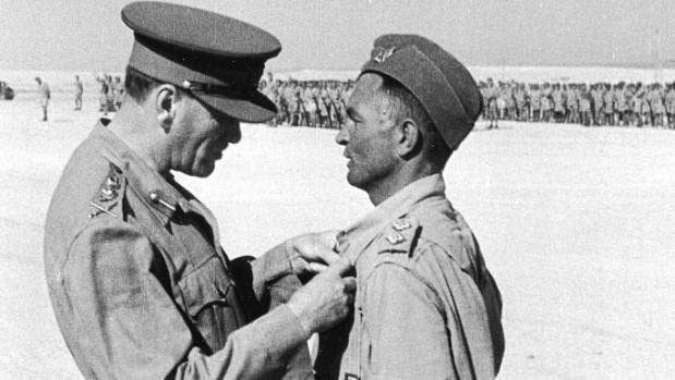Upham receives his first Victoria Cross.