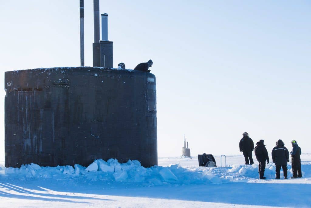 The Los Angeles-class fast-attack submarine USS Hartford (SSN 768) surfaces in the Beaufort Sea during Ice Exercise (ICEX) 2018. (Photo by U.S. Navy Mass Communication 2nd Class Micheal H. Lee)