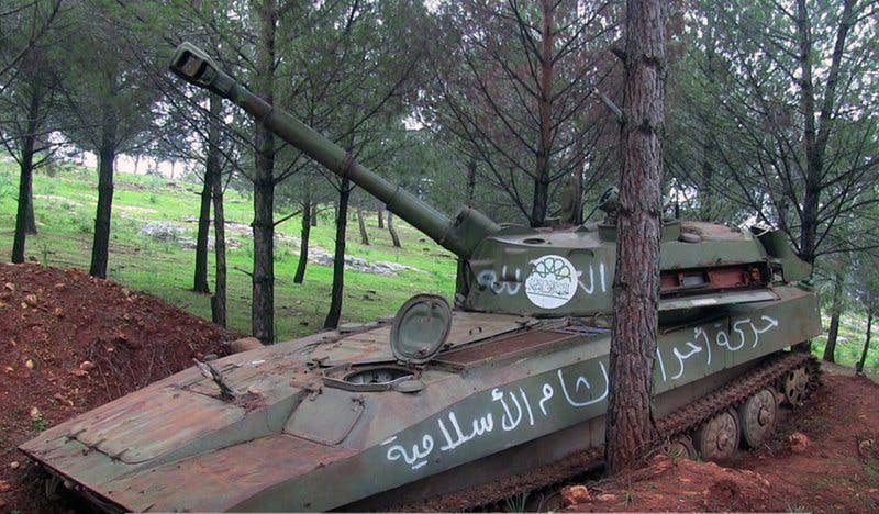 A tank with markings of the ultraconservative Ahrar al-Sham militant group, that was captured by Hay'at Tahrir al-Sham, in Idlib province, Syria. (Photo by Ibaa News Agency)