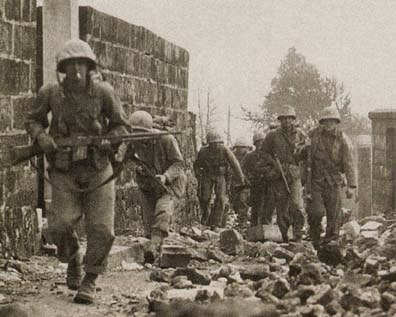 Marines from the 6th Marine Division on a patrol during the Battle of Okinawa. (USMC photo)