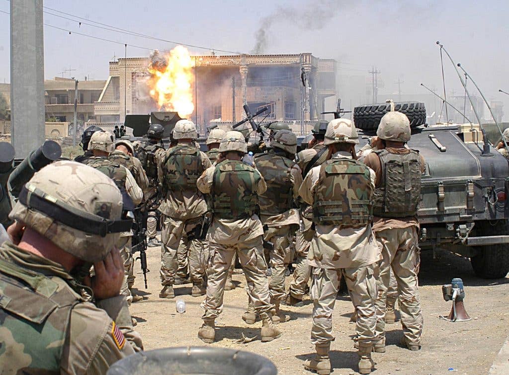 Later versions of Blood on the Risers depict the son of the song's hero serving with the 101st Airborne, pictured above during the operation that took out Uday and Qusay Hussein, during the War on Terror. (US Army photo)
