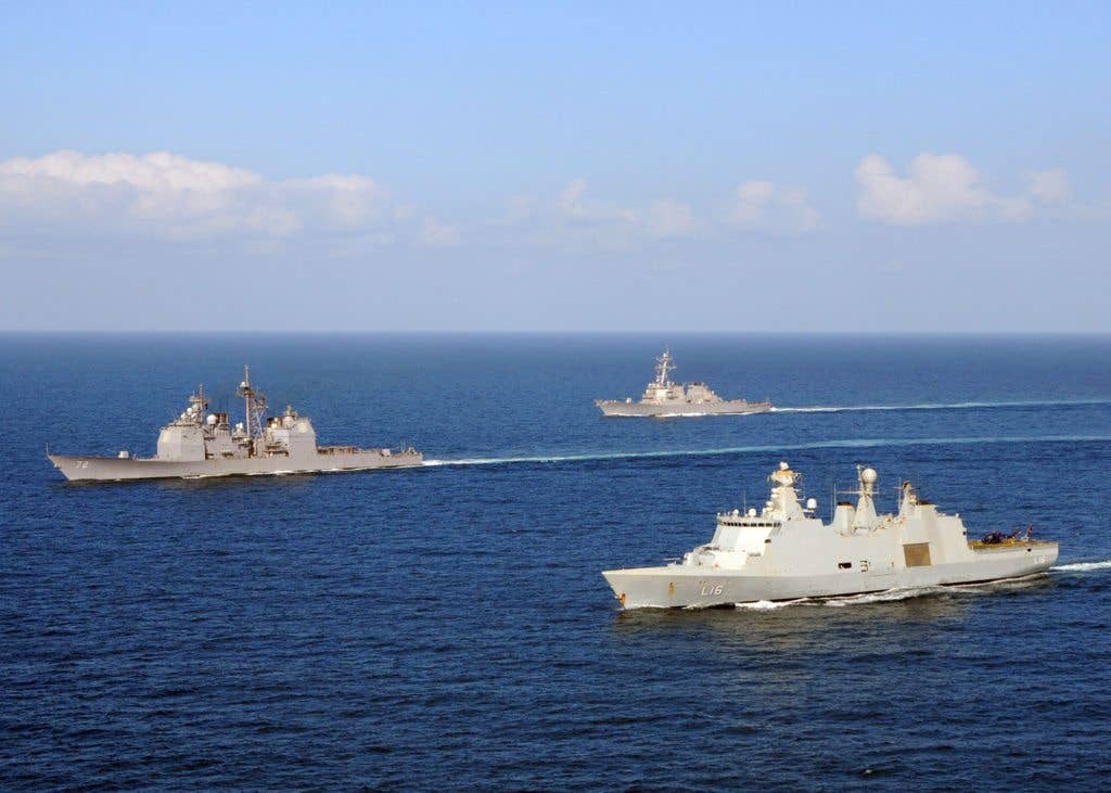 The Dutch flexible support ship HDMS Absalon (L 16), right, the guided-missile cruiser USS Vella Gulf (CG 72) and the guided-missile destroyer USS Mahan (DDG 72) transit the Gulf of Aden. Absalon arguably has a far more capable close-in weapon system than the Aegis warships. (U.S. Navy photo by Mass Communications Specialist 2nd Class Jason R. Zalasky)