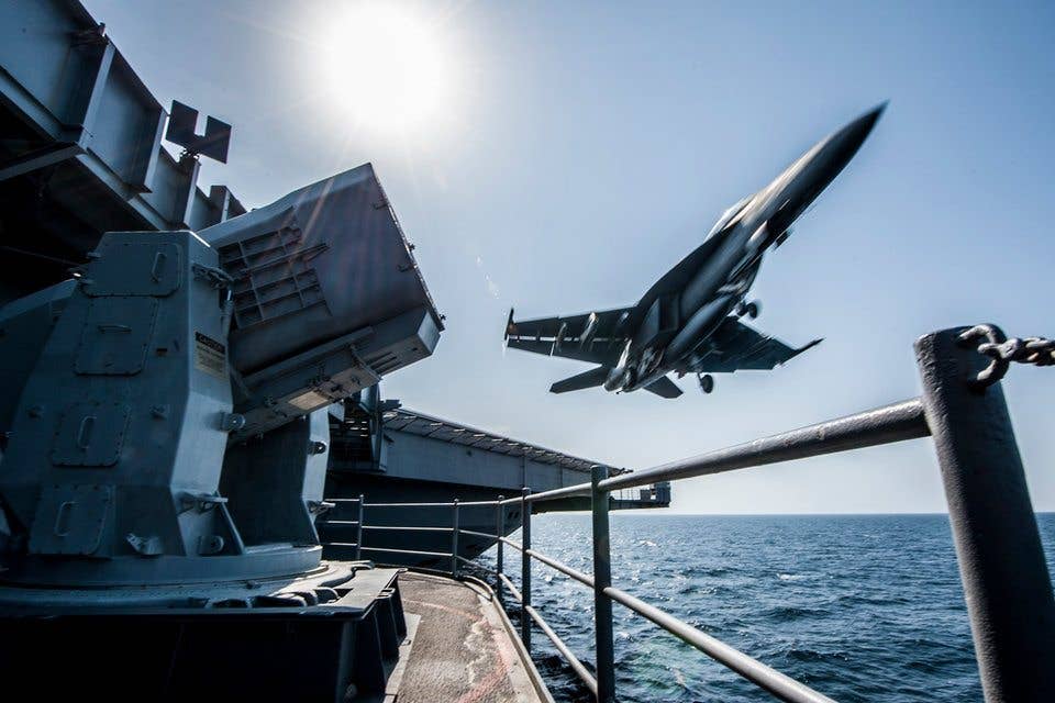 An F/A-18 Super Hornet launches from the flight deck of the Nimitz-class aircraft carrier USS Carl Vinson (CVN 70) as the ship conducts flight operations in the US 5th Fleet area of operations supporting Operation Inherent Resolve. (US Navy photo by Mass Communication Specialist 2nd Class Alex King)