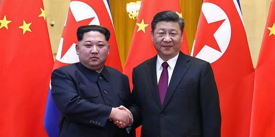 Kim with Chinese President Xi Jinping in Beijing. (Xinhua News)