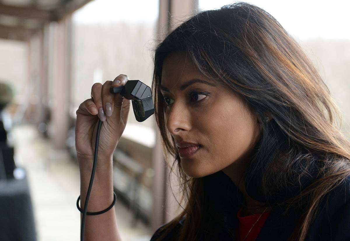 Rupal Varshneya, an electrical engineer at Communications-Electronics Research, Development and Engineering Center's Night Vision and Electronic Sensors Directorate, Fort Belvoir, Va., looks through a micro-display.