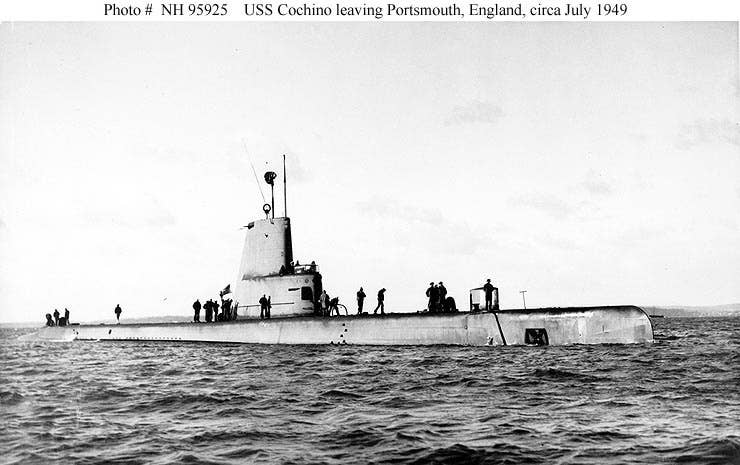 USS Cochino (SS 345) departing on her last mission. One civilian engineer was killed when she was lost, as well as six sailors from USS Tusk (SS 426). (U.S. Navy)